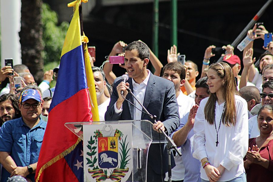 Juan Guaido speaks to protestors in Caracas. The country has been thrown into turmoil over recent elections. 