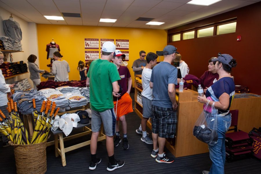 Students+and+parents+alike+check+out+the+new+Loyola+Wear+Store.+The+new+location+allows+for+easier+access+to+the+merchandise.+