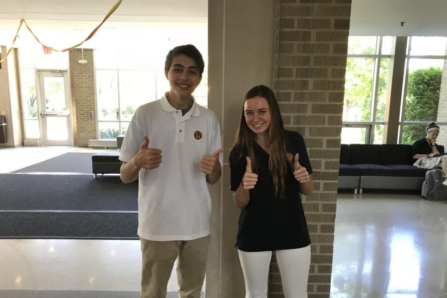 Matthew Kelsh and Frannie Whelan give a thumbs up to the environment. 