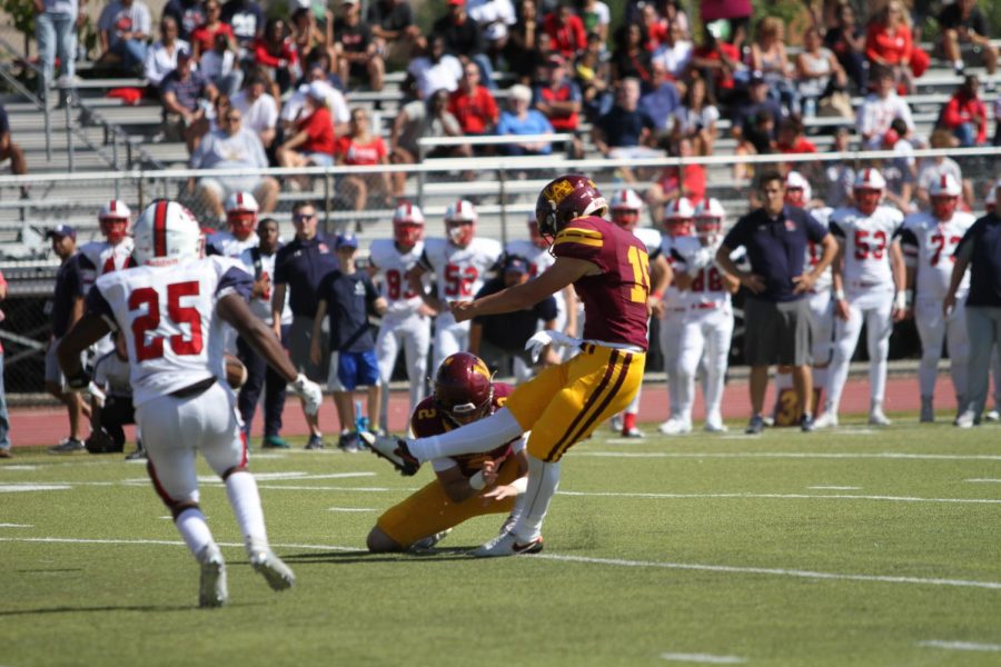 Junior Nate Van Zelst kicks a field goal. The field goal was the longest of his High School career.