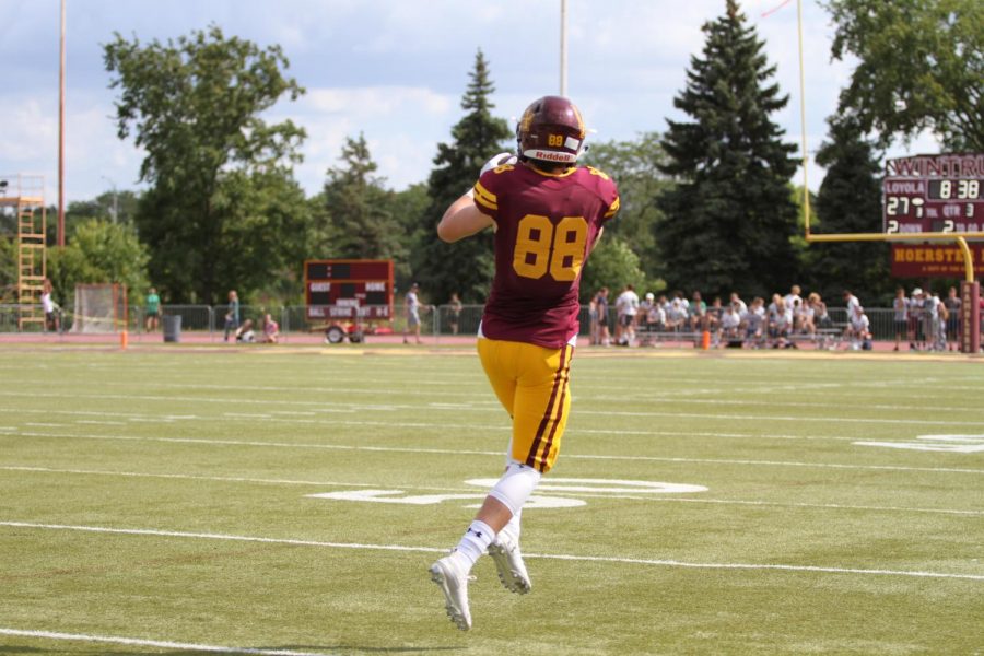 Senior wide receiver Matty Mangan makes a catch in an early game against New Trier. The Ramblers will need all their weapons to defeat Glenbard West in round two of the playoffs. 