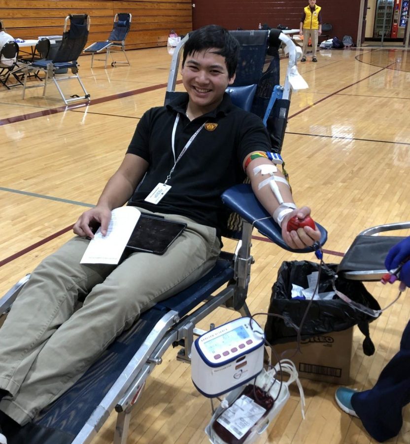 Loyola student gets his blood drawn. He was one of the many donors at Loyolas drive last winter.