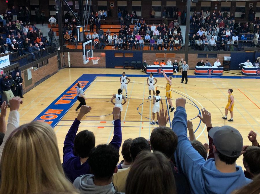 Senior+Bennett+Kwiecinksi+shoots+a+free+throw+in+the+final+minutes+against+the+Evanston+Wildkits.+Clutch+free+throw+shooting+and+lock+out+defense+would+help+the+Ramblers+defeat+their+Evanston+rivals.+