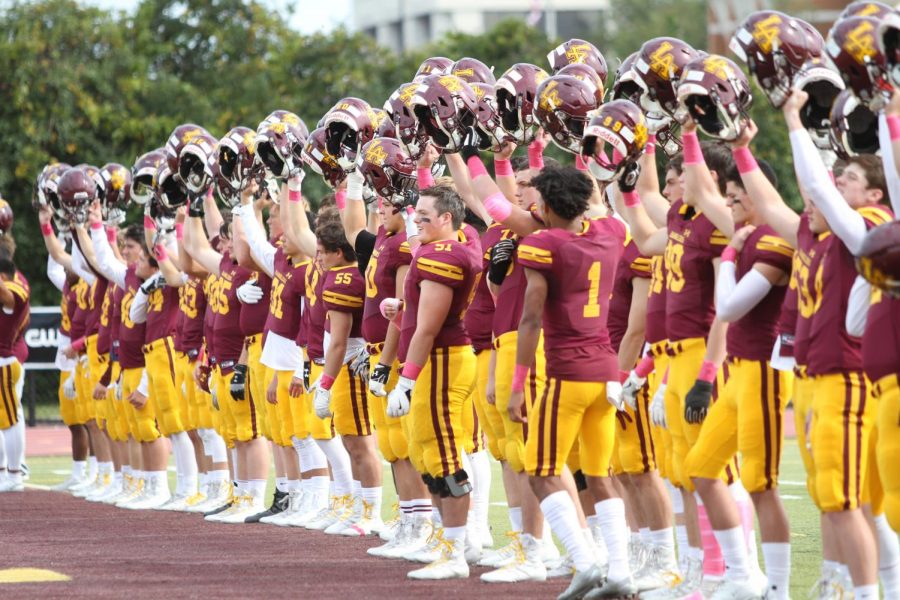 The 2019 Loyola football team acknowledges the crowd before a game. Scenes like these won't be happening in the fall of 2020. 