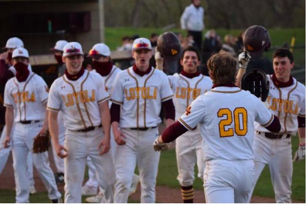 The team celebrates their huge victory over the Fenwick Friars. It was a great day at the hill for Loyola sports. 