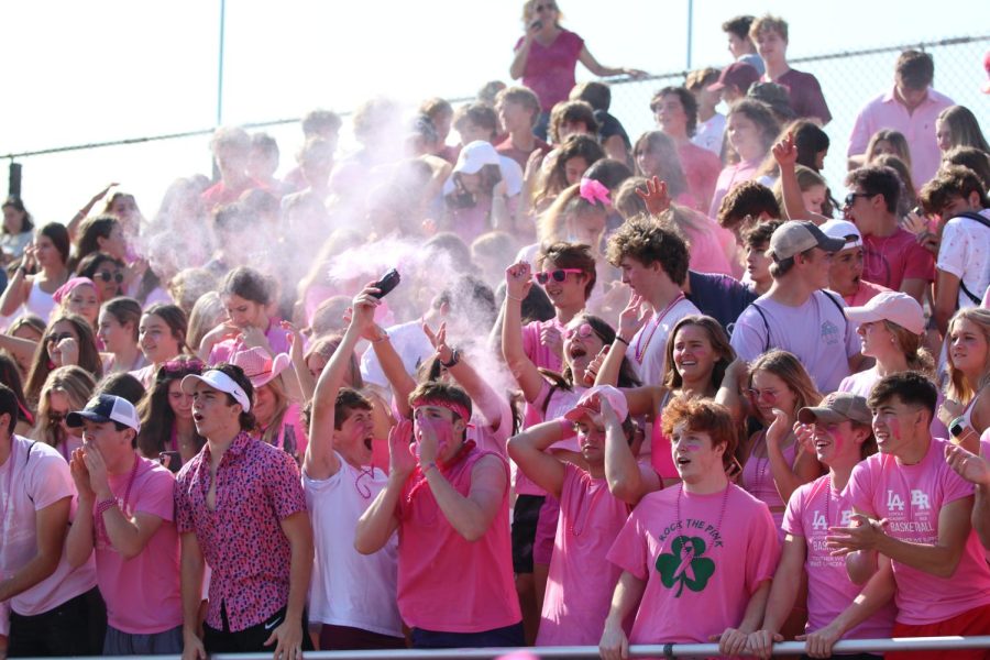 The+Student+Section+explodes+with+spirit+during+the+game+against+Providence.+The+theme+was+Pink+Out+for+Breast+Cancer+Awareness+month.+