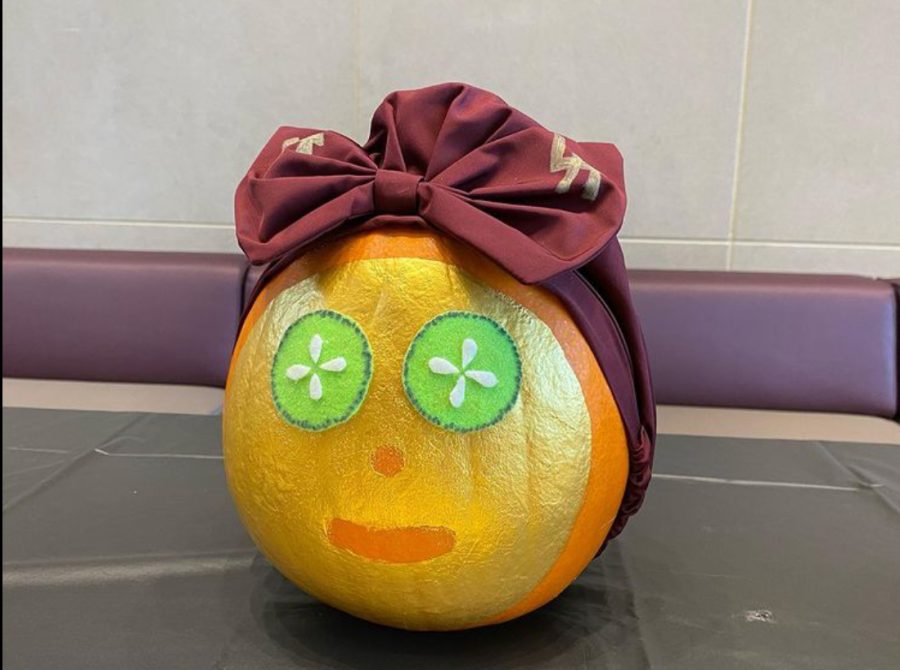 Sophomore Maggie Dominick’s spa themed pumpkin sits on display. It’s one of the many exciting pumpkins Loyola students decorated this fall. 
