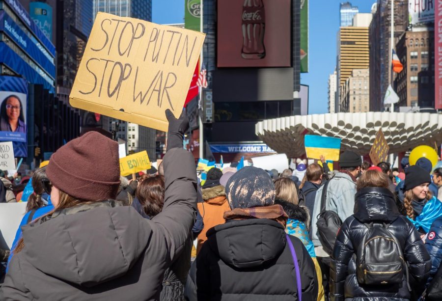 People protest the Russian invasion of Ukraine in New Yorks Times Square. Loyola students are also reacting to the invasion. 