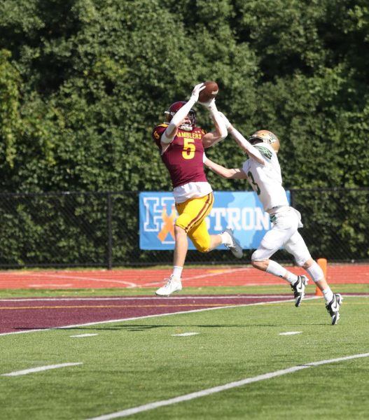 Senior wide receiver David Pezza makes an amazing catch for a touchdown against St. Pats earlier this season. The Ramblers will need all players at their best to defeat Mt. Carmel, the number one team in the state. 