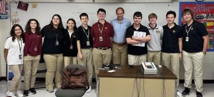 Scholastic Bowl members hang out with 29-Day Jeopardy Champion David Madden