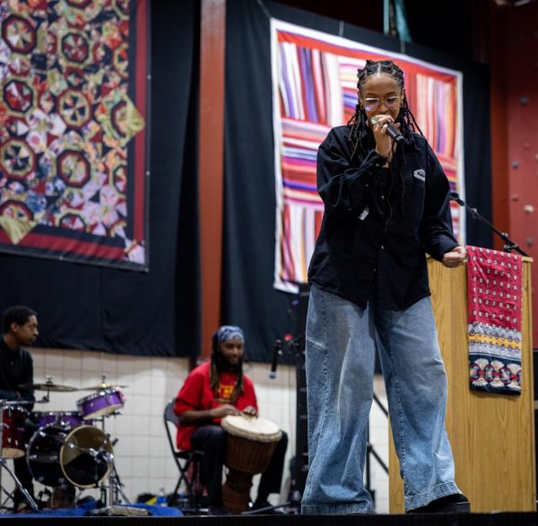 Alum Senite Barih (20) performs an original song at the MLK assembly. The presentation celebrated the achievements of black Americans throughout history. 