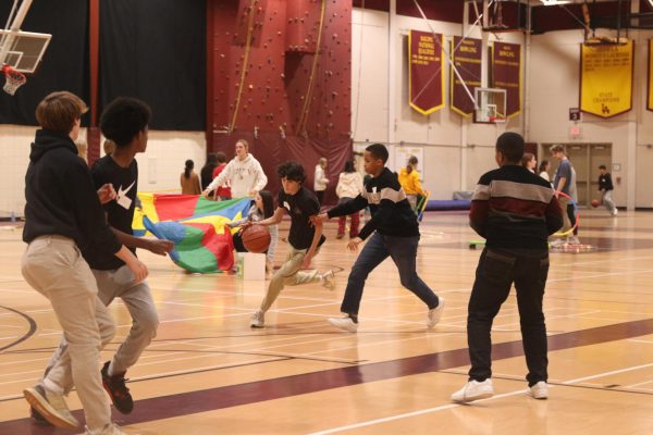 Students from Madonnas Mission enjoy the various games at Late Night at Loyola. Students could choose from games like basketball or craft activities. 