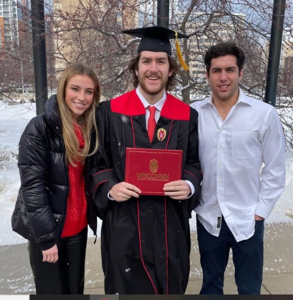 Hope Freda, Sam Freda, and Nicholas Freda celebrate Sams graduation from the University of Wisconsin.