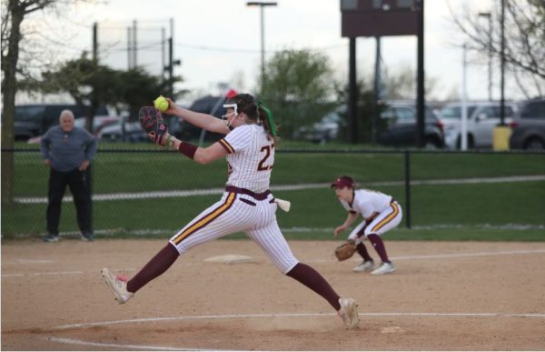 Pitcher Hunter Lewis is in motion as she dominates against Palatine High school. 